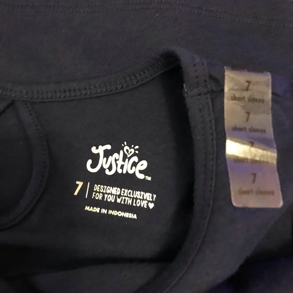 Justice girl’s dark blue size 7 t-shirt. New with size tag on shoulder